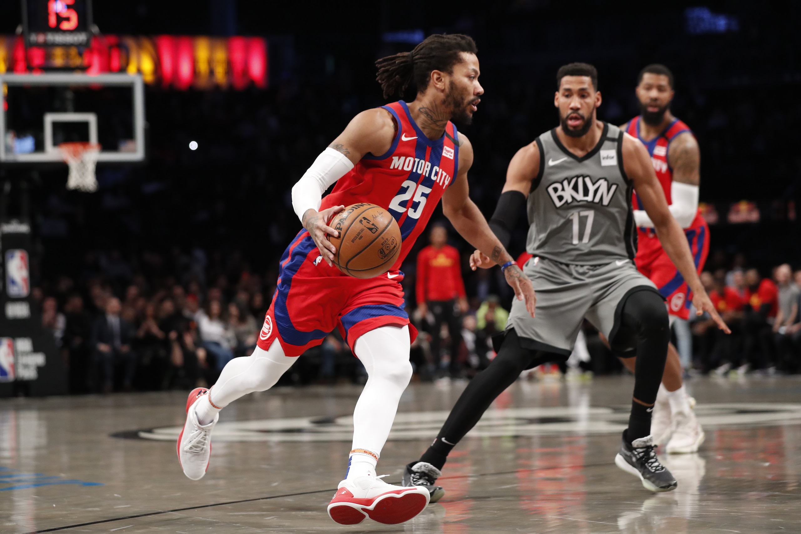 Detroit Pistons guard Derrick Rose (25) drives around Brooklyn Nets guard Garrett Temple (17) during the first half of an NBA basketball game, Wednesday, Jan. 29, 2020, in New York. (AP Photo/Kathy Willens)