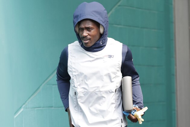 New England Patriots wide receiver Antonio Brown enter the field before an NFL football game against the Miami Dolphins, Sunday, Sept. 15, 2019, in Miami Gardens, Fla. (AP Photo/Lynne Sladky)