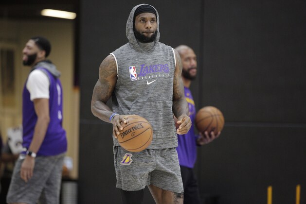 Los Angeles Lakers forward LeBron James, grips the ball during NBA basketball practice in El Segundo, Calif., Thursday, Jan. 30, 2020. The Lakers held their second practice Thursday, while they continue to grieve for former player Kobe Bryant. (AP Photo/Damian Dovarganes) Los Angeles Lakers forward LeBron James, grips the ball during NBA basketball practice in El Segundo, Calif., Thursday, Jan. 30, 2020. The Lakers held their second practice Thursday, while they continue to grieve for former player Kobe Bryant. (AP Photo/Damian Dovarganes)