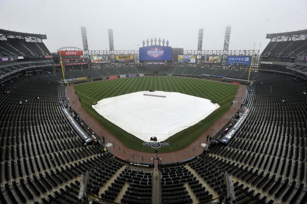 A rain tarp covers the field at Guaranteed Rate Field during a rain delay on opening day before an MLB baseball game between the Chicago White Sox and Detroit Tigers, Monday, April 3, 2017 in Chicago. (AP Photo/Paul Beaty) A rain tarp covers the field at Guaranteed Rate Field during a rain delay on opening day before an MLB baseball game between the Chicago White Sox and Detroit Tigers, Monday, April 3, 2017 in Chicago. (AP Photo/Paul Beaty)