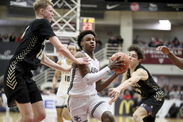 Sierra Canyon's Bronny James #0 in action against Paul VI during a high school basketball game at the Hoophall Classic, Monday, January 20, 2020, in Springfield, MA. (AP Photo/Gregory Payan)