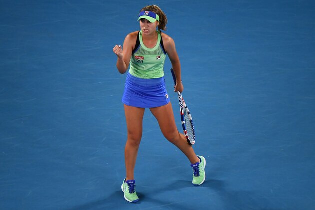 Sofia Kenin of the US reacts as she plays against Spain's Garbine Muguruza during their women's singles final match on day thirteen of the Australian Open tennis tournament in Melbourne on February 1, 2020. (Photo by William WEST / AFP) / IMAGE RESTRICTED TO EDITORIAL USE - STRICTLY NO COMMERCIAL USE (Photo by WILLIAM WEST/AFP via Getty Images)