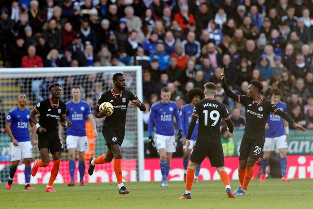 Chelsea's German defender Antonio Rudiger (C) celebrates scoring his team's second goal during the English Premier League football match between Leicester City and Chelsea at King Power Stadium in Leicester, central England on February 1, 2020. (Photo by Adrian DENNIS / AFP) / RESTRICTED TO EDITORIAL USE. No use with unauthorized audio, video, data, fixture lists, club/league logos or 'live' services. Online in-match use limited to 120 images. An additional 40 images may be used in extra time. No video emulation. Social media in-match use limited to 120 images. An additional 40 images may be used in extra time. No use in betting publications, games or single club/league/player publications. /  (Photo by ADRIAN DENNIS/AFP via Getty Images)