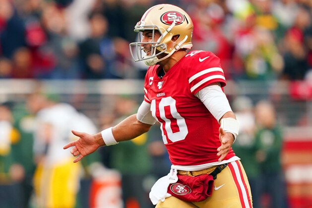SANTA CLARA, CALIFORNIA - JANUARY 19: Jimmy Garoppolo #10 of the San Francisco 49ers reacts to a touchdown run by Raheem Mostert #31 in the first quarter against the Green Bay Packers during the NFC Championship game at Levi's Stadium on January 19, 2020 in Santa Clara, California. (Photo by Thearon W. Henderson/Getty Images) SANTA CLARA, CALIFORNIA - JANUARY 19: Jimmy Garoppolo #10 of the San Francisco 49ers reacts to a touchdown run by Raheem Mostert #31 in the first quarter against the Green Bay Packers during the NFC Championship game at Levi's Stadium on January 19, 2020 in Santa Clara, California. (Photo by Thearon W. Henderson/Getty Images)