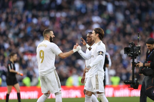 MADRID, SPAIN - FEBRUARY 01: Karim Benzema of Real Madrid celebrates victory with Vinicius Junior and Sergio Ramos after the La Liga match between Real Madrid CF and Club Atletico de Madrid at Estadio Santiago Bernabeu on February 01, 2020 in Madrid, Spain. (Photo by Angel Martinez/Getty Images) MADRID, SPAIN - FEBRUARY 01: Karim Benzema of Real Madrid celebrates victory with Vinicius Junior and Sergio Ramos after the La Liga match between Real Madrid CF and Club Atletico de Madrid at Estadio Santiago Bernabeu on February 01, 2020 in Madrid, Spain. (Photo by Angel Martinez/Getty Images)