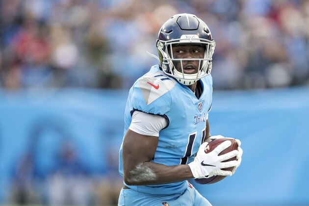 NASHVILLE, TN - DECEMBER 15:  A.J. Brown #11 of the Tennessee Titans runs the ball after catching a pass during a game against the Houston Texans at Nissan Stadium on December 15, 2019 in Nashville, Tennessee.  The Texans defeated the Titans 24-21.  (Photo by Wesley Hitt/Getty Images)
