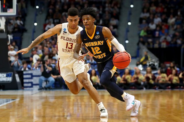 HARTFORD, CONNECTICUT - MARCH 23:  Ja Morant #12 of the Murray State Racers is defended by Anthony Polite #13 of the Florida State Seminoles in the second half during the second round of the 2019 NCAA Men's Basketball Tournament at XL Center on March 23, 2019 in Hartford, Connecticut. (Photo by Maddie Meyer/Getty Images)