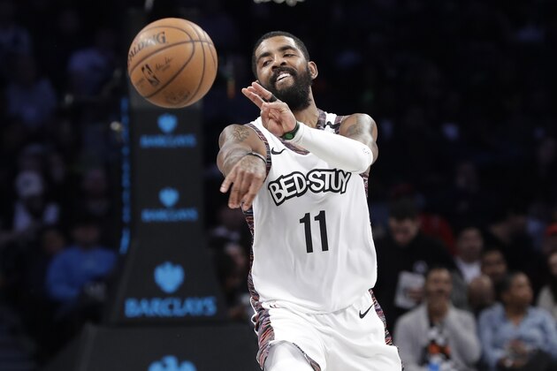 Brooklyn Nets' Kyrie Irving (11) passes the ball during the second half of the team's NBA basketball game against the Chicago Bulls on Friday, Jan. 31, 2020, in New York. The Nets won 133-118. (AP Photo/Frank Franklin II)