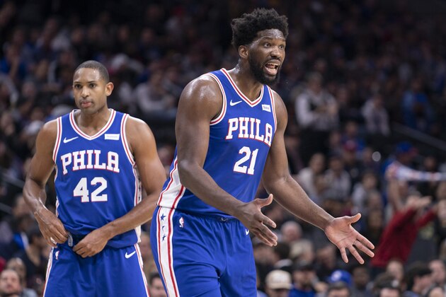 PHILADELPHIA, PA - DECEMBER 10: Joel Embiid #21 and Al Horford #42 of the Philadelphia 76ers react against the Denver Nuggets at the Wells Fargo Center on December 10, 2019 in Philadelphia, Pennsylvania. NOTE TO USER: User expressly acknowledges and agrees that, by downloading and/or using this photograph, user is consenting to the terms and conditions of the Getty Images License Agreement. (Photo by Mitchell Leff/Getty Images)