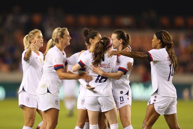 HOUSTON, TX - JANUARY 31: Christen Press #20 celebrates with his team mates the 5th goal during the CONCACAF Women's Olympic Qualifying group A game between Panama and USA at BBVA Compass Stadium on January 31, 2020 in Houston, Texas. (Photo by Omar Vega/Getty Images)