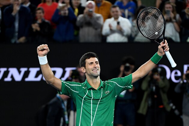 MELBOURNE, AUSTRALIA - FEBRUARY 02: Novak Djokovic of Serbia celebrates winning championship point after his Men's Singles Final against Dominic Thiem of Austria on day fourteen of the 2020 Australian Open at Melbourne Park on February 02, 2020 in Melbourne, Australia. (Photo by Quinn Rooney/Getty Images)
