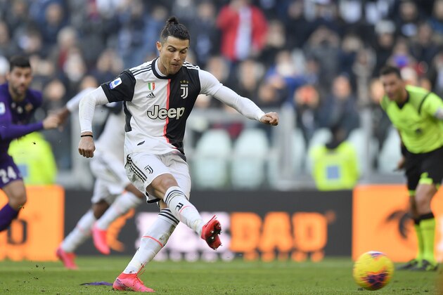 Juventus' Cristiano Ronaldo shoots to score on a penalty during a Serie A soccer match between Juventus and Fiorentina, in Turin, Italy, Sunday, Feb. 2, 2020. (Fabio Ferrari/LaPresse via AP)