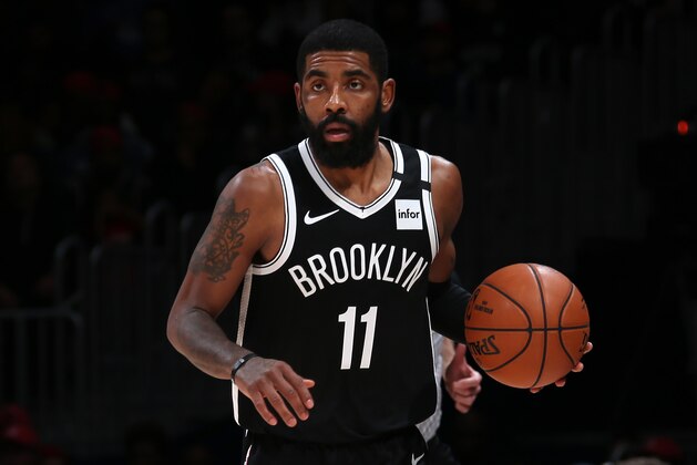 WASHINGTON, DC - FEBRUARY 1: Kyrie Irving #11 of the Brooklyn Nets handles the ball against the Washington Wizards on February 1, 2020 at Capital One Arena in Washington, DC. NOTE TO USER: User expressly acknowledges and agrees that, by downloading and or using this Photograph, user is consenting to the terms and conditions of the Getty Images License Agreement. Mandatory Copyright Notice: Copyright 2020 NBAE (Photo by Ned Dishman/NBAE via Getty Images) WASHINGTON, DC - FEBRUARY 1: Kyrie Irving #11 of the Brooklyn Nets handles the ball against the Washington Wizards on February 1, 2020 at Capital One Arena in Washington, DC. NOTE TO USER: User expressly acknowledges and agrees that, by downloading and or using this Photograph, user is consenting to the terms and conditions of the Getty Images License Agreement. Mandatory Copyright Notice: Copyright 2020 NBAE (Photo by Ned Dishman/NBAE via Getty Images)