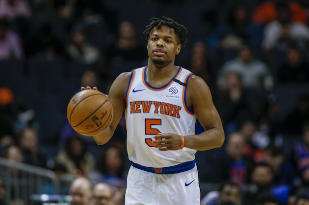 New York Knicks guard Dennis Smith Jr. brings the ball up court against the Charlotte Hornets in the second half of an NBA basketball game in Charlotte, N.C., Tuesday, Jan. 28, 2020. Charlotte won 97-92. (AP Photo/Nell Redmond) New York Knicks guard Dennis Smith Jr. brings the ball up court against the Charlotte Hornets in the second half of an NBA basketball game in Charlotte, N.C., Tuesday, Jan. 28, 2020. Charlotte won 97-92. (AP Photo/Nell Redmond)