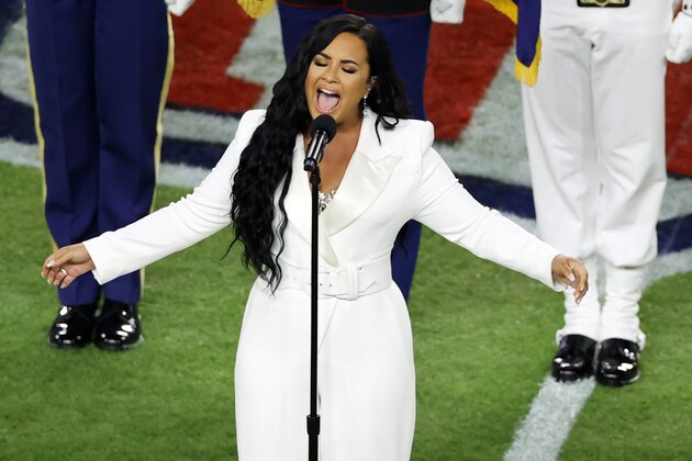MIAMI, FLORIDA - FEBRUARY 02: Singer Demi Lovato performs the national anthem prior to Super Bowl LIV between the San Francisco 49ers and the Kansas City Chiefs at Hard Rock Stadium on February 02, 2020 in Miami, Florida. (Photo by Elsa/Getty Images)