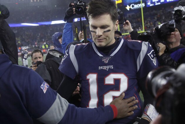 New England Patriots quarterback Tom Brady leaves the field after losing to the Tennessee Titans in an NFL wild-card playoff football game, Saturday, Jan. 4, 2020, in Foxborough, Mass. (AP Photo/Elise Amendola)