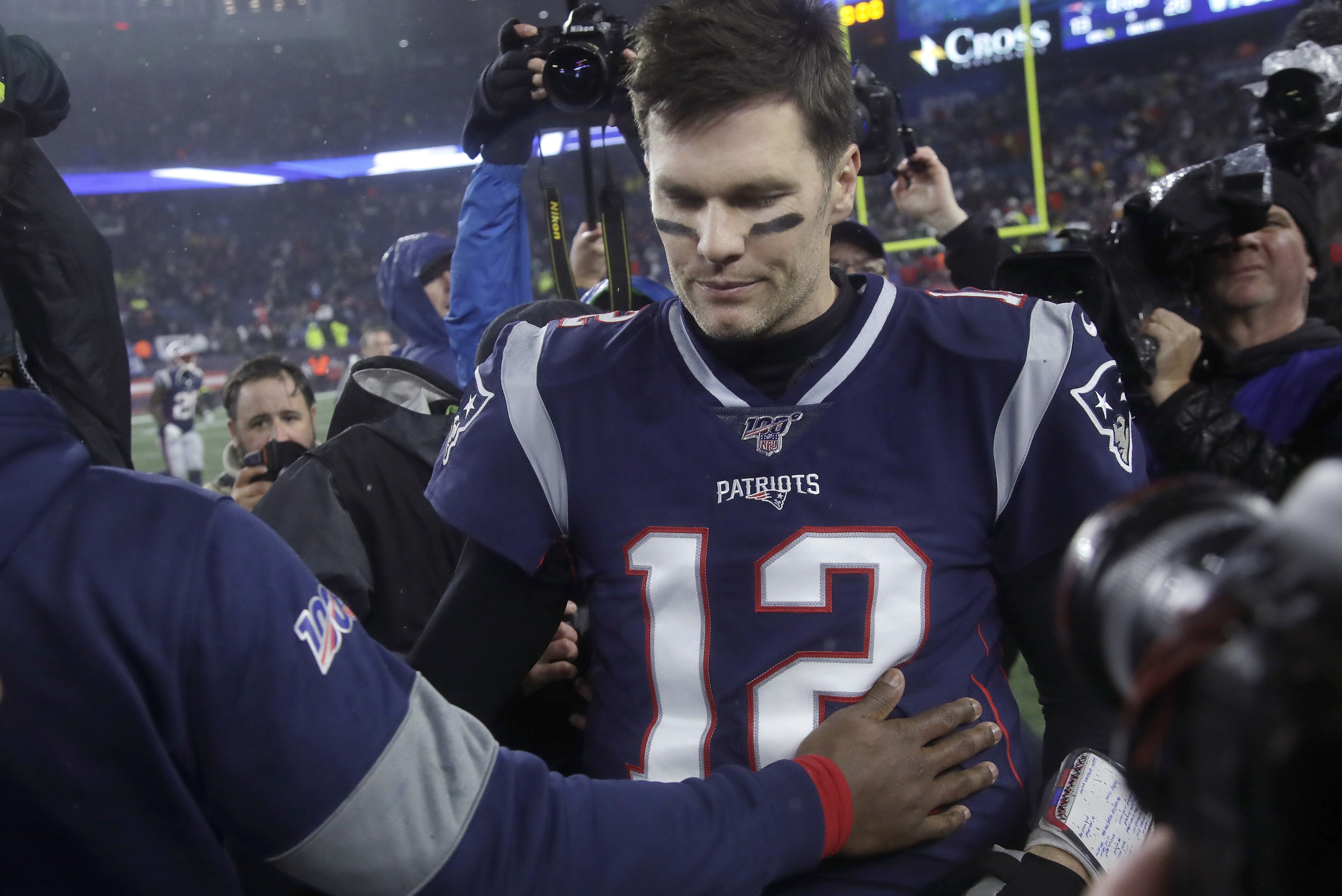 New England Patriots quarterback Tom Brady leaves the field after losing to the Tennessee Titans in an NFL wild-card playoff football game, Saturday, Jan. 4, 2020, in Foxborough, Mass. (AP Photo/Elise Amendola)
