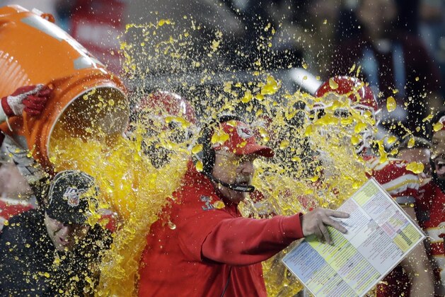 Kansas City Chiefs head coach Andy Reid is doused on the sideline during the second half of the NFL Super Bowl 54 football game against the San Francisco 49ers Sunday, Feb. 2, 2020, in Miami Gardens, Fla. (AP Photo/John Bazemore)