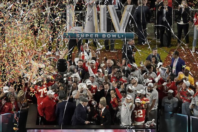 NFL Hall of Fame player Terry Bradshaw congratulates Kansas City Chiefs owner Clark Hunt and Norma Hunt after the team won the NFL Super Bowl 54 football game Sunday, Feb. 2, 2020, in Miami Gardens, Fla. The Chief's defeated the San Francisco 49ers 31-20. (AP Photo/Morry Gash)