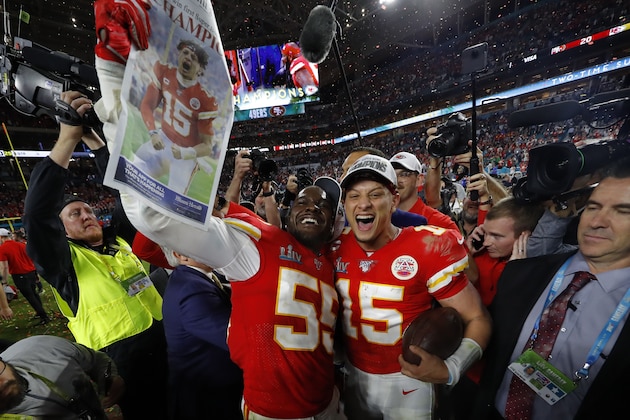 MIAMI, FLORIDA - FEBRUARY 02: Frank Clark #55 of the Kansas City Chiefs and Patrick Mahomes #15 of the Kansas City Chiefs celebrate after defeating San Francisco 49ers by 31 - 20in Super Bowl LIV at Hard Rock Stadium on February 02, 2020 in Miami, Florida. (Photo by Kevin C. Cox/Getty Images)