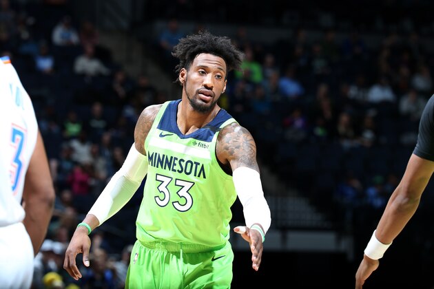MINNEAPOLIS, MN -  JANUARY 25: Robert Covington #33 of the Minnesota Timberwolves high-fives teammate against the Oklahoma City Thunder on January 25, 2020 at Target Center in Minneapolis, Minnesota. NOTE TO USER: User expressly acknowledges and agrees that, by downloading and or using this Photograph, user is consenting to the terms and conditions of the Getty Images License Agreement. Mandatory Copyright Notice: Copyright 2020 NBAE (Photo by David Sherman/NBAE via Getty Images)