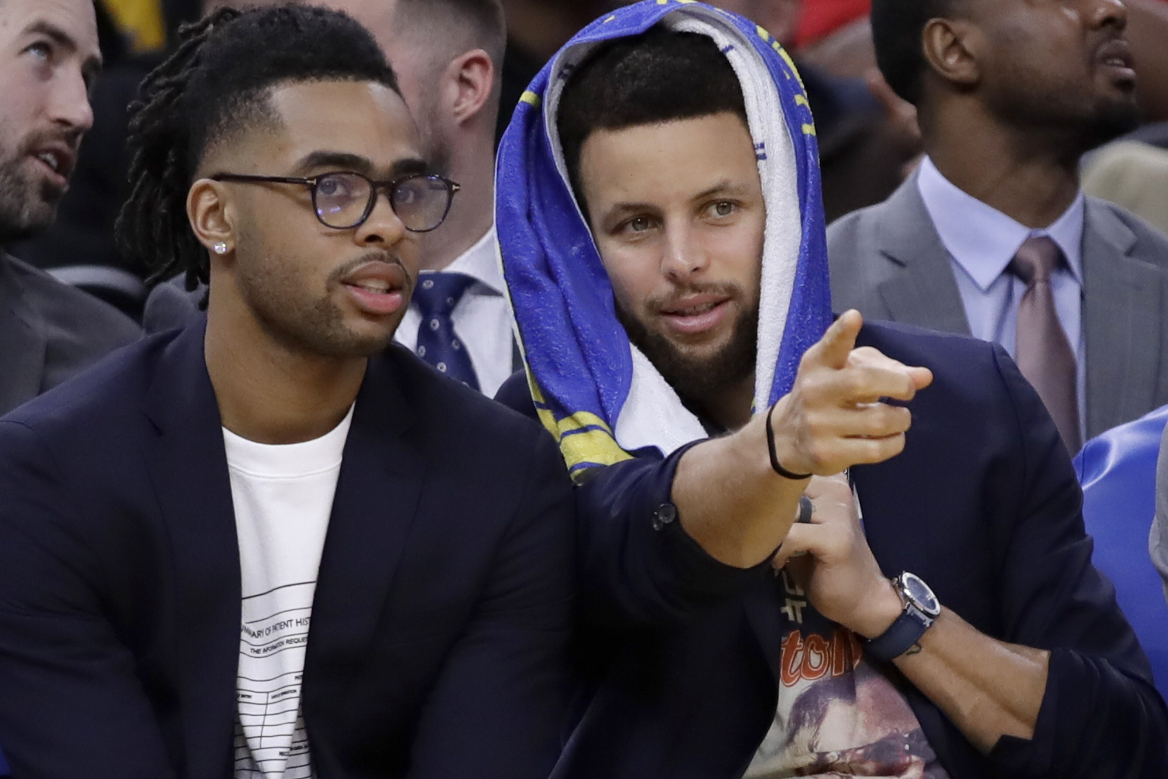 Golden State Warriors' Stephen Curry, right, gestures while speaking to teammate D'Angelo Russell on the bench as they watch during the second half of the team's NBA basketball game against the Milwaukee Bucks on Wednesday, Jan. 8, 2020, in San Francisco. (AP Photo/Ben Margot) Golden State Warriors' Stephen Curry, right, gestures while speaking to teammate D'Angelo Russell on the bench as they watch during the second half of the team's NBA basketball game against the Milwaukee Bucks on Wednesday, Jan. 8, 2020, in San Francisco. (AP Photo/Ben Margot)