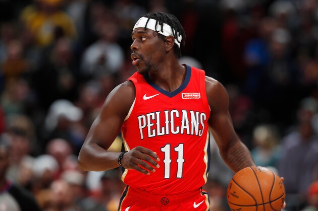 New Orleans Pelicans guard Jrue Holiday (11) in the first half of an NBA basketball game Wednesday, Dec. 25, 2019, in Denver. (AP Photo/David Zalubowski)