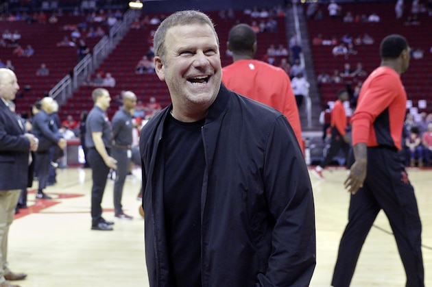 New Houston Rockets owner Tilman Fertitta before the start of an NBA preseason basketball game against the San Antonio Spurs Friday, Oct. 13, 2017, in Houston. (AP Photo/Michael Wyke)