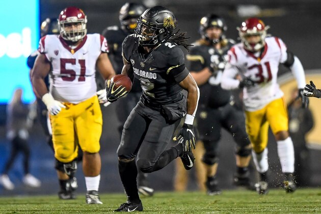 BOULDER, CO - OCTOBER 25:  Laviska Shenault Jr. #2 of the Colorado Buffaloes carries the ball for a 73-yard touchdown catch against the USC Trojans in the third quarter of a game at Folsom Field on October 25, 2019 in Boulder, Colorado.  (Photo by Dustin Bradford/Getty Images)