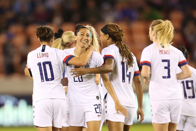 HOUSTON, TX - FEBRUARY 03: Christen Press #20 of USA celebrates with his team mates the 1st goal during the Group A game between the United States and Costa Rica as part of the 2020 CONCACAF Women's Olympic Qualifying at BBVA Compass Stadium on February 3, 2020 in Houston, Texas. (Photo by Omar Vega/Getty Images)