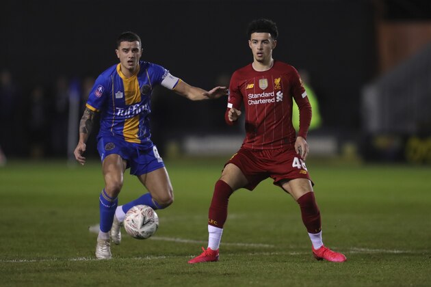 SHREWSBURY, ENGLAND - JANUARY 26: Curtis Jones of Liverpool and Oliver Norburn of Shrewsbury Town during the FA Cup Fourth Round match between Shrewsbury Town and Liverpool at New Meadow on January 26, 2020 in Shrewsbury, England. (Photo by James Baylis - AMA/Getty Images)