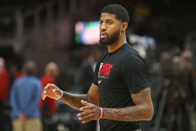 Los Angeles Clippers forward Paul George (13) warms up before an NBA basketball game against the Atlanta Hawks, Wednesday, Jan. 22, 2020, in Atlanta. (AP Photo/Brett Davis) Los Angeles Clippers forward Paul George (13) warms up before an NBA basketball game against the Atlanta Hawks, Wednesday, Jan. 22, 2020, in Atlanta. (AP Photo/Brett Davis)