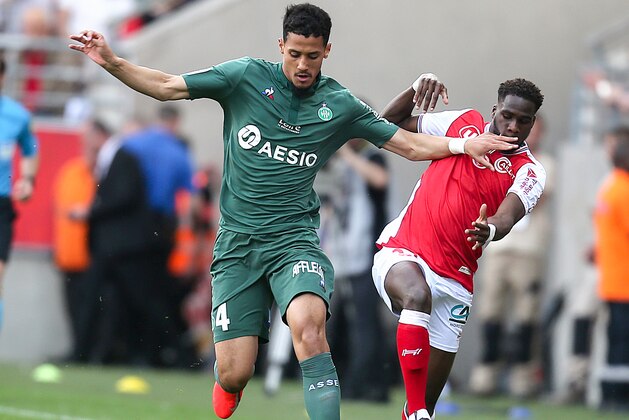 Saint-Etienne's French defender William Saliba (L) vies with Reims' French forward Boulaye Dia during the French L1 football match between Stade de Reims and Saint-Etienne (ASSE) on April 21, 2019 at the Auguste-Delaune stadium in Reims. (Photo by FRANCOIS NASCIMBENI / AFP)        (Photo credit should read FRANCOIS NASCIMBENI/AFP via Getty Images)