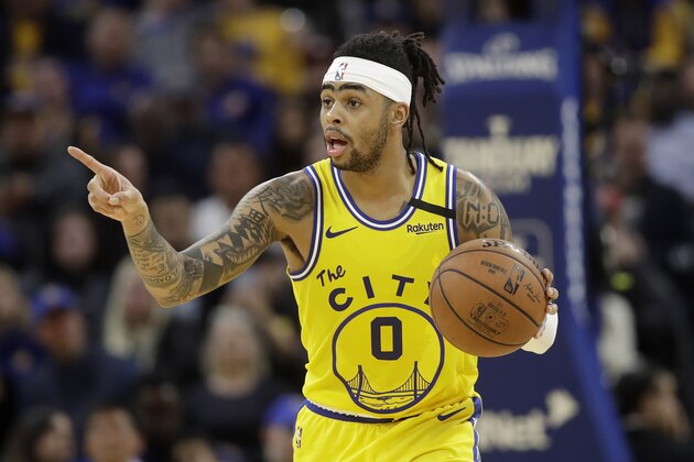 Golden State Warriors guard D'Angelo Russell (0) dribbles the ball up the court against the Indiana Pacers during the second half of an NBA basketball game in San Francisco, Friday, Jan. 24, 2020. (AP Photo/Jeff Chiu)