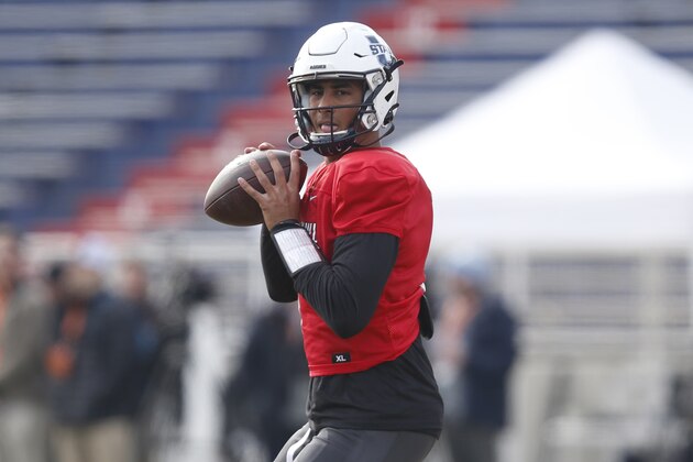 Utah State's Jordan Love throws a pass as the North squad runs drills during practice for the Senior Bowl Wednesday, Jan. 22, 2020, in Mobile, Ala. (AP Photo/Butch Dill)