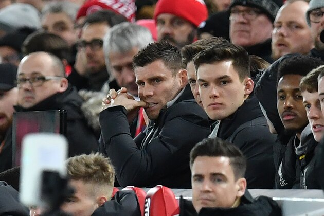 Liverpool's English midfielder James Milner (C) watches from his seat during the English FA Cup fourth round reply football match between Liverpool and Shrewsbury Town at Anfield in Liverpool, north west England on February 4, 2020. (Photo by Paul ELLIS / AFP) / RESTRICTED TO EDITORIAL USE. No use with unauthorized audio, video, data, fixture lists, club/league logos or 'live' services. Online in-match use limited to 120 images. An additional 40 images may be used in extra time. No video emulation. Social media in-match use limited to 120 images. An additional 40 images may be used in extra time. No use in betting publications, games or single club/league/player publications. / (Photo by PAUL ELLIS/AFP via Getty Images) Liverpool's English midfielder James Milner (C) watches from his seat during the English FA Cup fourth round reply football match between Liverpool and Shrewsbury Town at Anfield in Liverpool, north west England on February 4, 2020. (Photo by Paul ELLIS / AFP) / RESTRICTED TO EDITORIAL USE. No use with unauthorized audio, video, data, fixture lists, club/league logos or 'live' services. Online in-match use limited to 120 images. An additional 40 images may be used in extra time. No video emulation. Social media in-match use limited to 120 images. An additional 40 images may be used in extra time. No use in betting publications, games or single club/league/player publications. / (Photo by PAUL ELLIS/AFP via Getty Images)