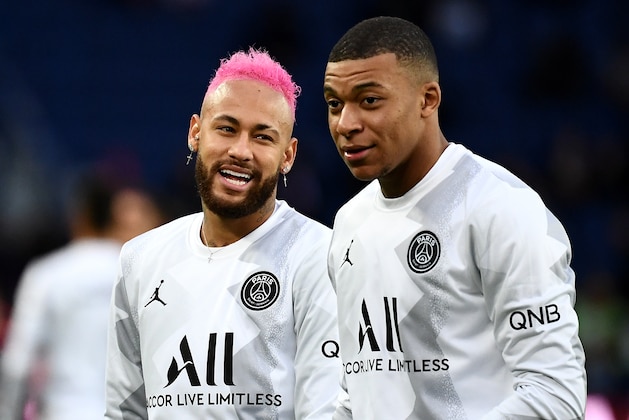 Paris Saint-Germain's Brazilian forward Neymar (L) jokes with Paris Saint-Germain's French forward Kylian MBappe prior to the French L1 football match between Paris Saint-Germain (PSG) and Montpellier Herault SC at the Parc des Princes stadium in Paris, on February 1, 2020. (Photo by FRANCK FIFE / AFP) (Photo by FRANCK FIFE/AFP via Getty Images)