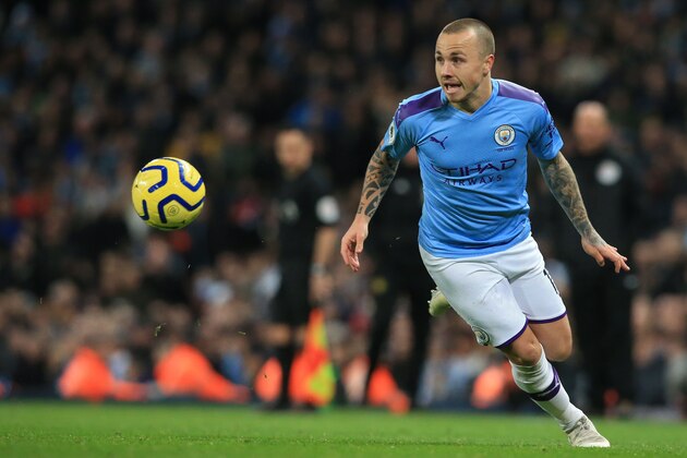 Manchester City's Spanish defender Angelino plays the ball during the English Premier League football match between Manchester City and Manchester United at the Etihad Stadium in Manchester, north west England, on December 7, 2019. (Photo by Lindsey Parnaby / AFP) / RESTRICTED TO EDITORIAL USE. No use with unauthorized audio, video, data, fixture lists, club/league logos or 'live' services. Online in-match use limited to 120 images. An additional 40 images may be used in extra time. No video emulation. Social media in-match use limited to 120 images. An additional 40 images may be used in extra time. No use in betting publications, games or single club/league/player publications. / (Photo by LINDSEY PARNABY/AFP via Getty Images) Manchester City's Spanish defender Angelino plays the ball during the English Premier League football match between Manchester City and Manchester United at the Etihad Stadium in Manchester, north west England, on December 7, 2019. (Photo by Lindsey Parnaby / AFP) / RESTRICTED TO EDITORIAL USE. No use with unauthorized audio, video, data, fixture lists, club/league logos or 'live' services. Online in-match use limited to 120 images. An additional 40 images may be used in extra time. No video emulation. Social media in-match use limited to 120 images. An additional 40 images may be used in extra time. No use in betting publications, games or single club/league/player publications. / (Photo by LINDSEY PARNABY/AFP via Getty Images)