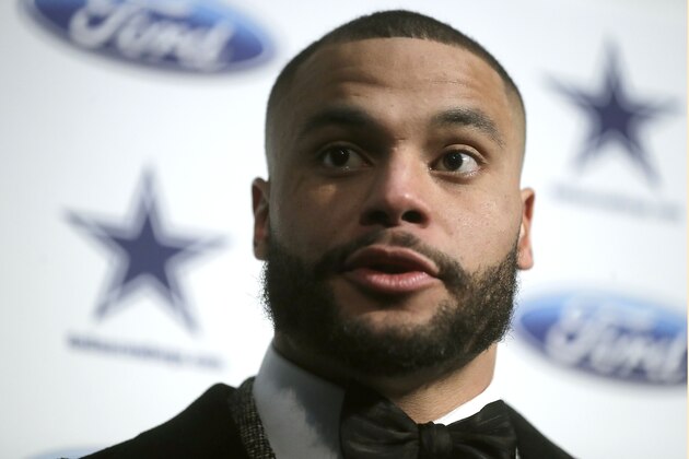 Dallas Cowboys quarterback Dak Prescott speaks to the media following an NFL football game against the New England Patriots, Sunday, Nov. 24, 2019, in Foxborough, Mass. (AP Photo/Steven Senne)