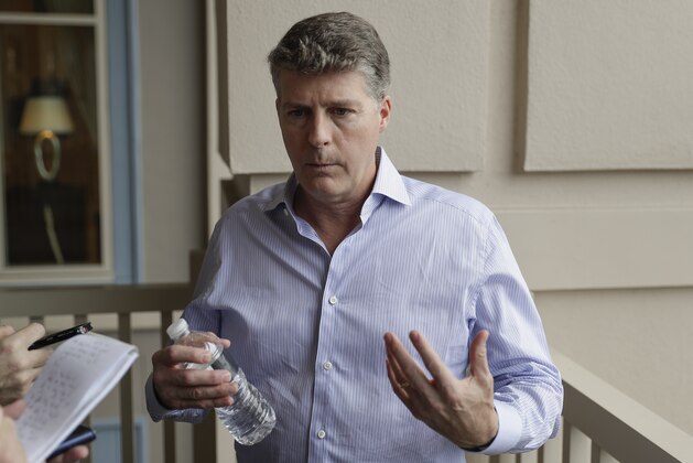 Hal Steinbrenner, principal owner of the New York Yankees, talks with reporters during MLB baseball owners meetings, Wednesday, Feb. 5, 2020, in Orlando, Fla. (AP Photo/John Raoux)