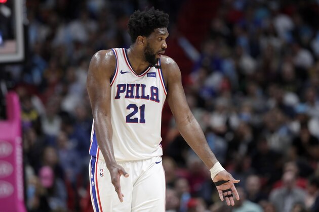 Philadelphia 76ers center Joel Embiid argues a call during the second half of an NBA basketball game against the Miami Heat, Monday, Feb. 3, 2020, in Miami. The Heat won 137-106. (AP Photo/Lynne Sladky)