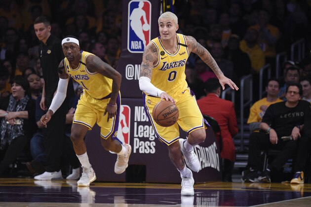 Los Angeles Lakers forward Kyle Kuzma brings the ball down the court during the second half of an NBA basketball game against the Portland Trail Blazers in Los Angeles, Friday, Jan. 31, 2020. (AP Photo/Kelvin Kuo)