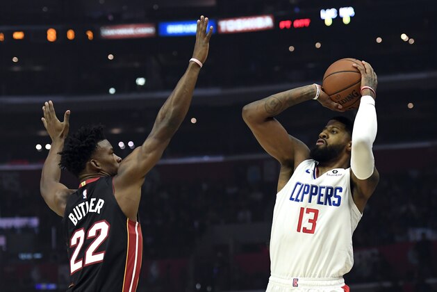 LOS ANGELES, CA - FEBRUARY 05: Paul George #13 of the Los Angeles Clippers shoots a jump shot against Jimmy Butler #22 of the Miami Heat during the first half at Staples Center on February 5, 2020 in Los Angeles, California. NOTE TO USER: User expressly acknowledges and agrees that, by downloading and/or using this Photograph, user is consenting to the terms and conditions of the Getty Images License Agreement. (Photo by Kevork Djansezian/Getty Images)