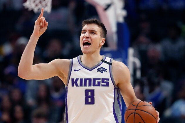 Sacramento Kings guard Bogdan Bogdanovic brings the ball up court during the second half of an NBA basketball game, Wednesday, Jan. 22, 2020, in Detroit. (AP Photo/Carlos Osorio)