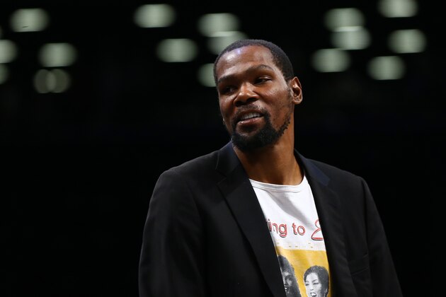 NEW YORK, NEW YORK - FEBRUARY 03: Kevin Durant  #7 of the Brooklyn Nets looks on from the bench during the game Phoenix Suns at Barclays Center on February 03, 2020 in New York City.Brooklyn Nets defeated the Phoenix Suns 119-97. NOTE TO USER: User expressly acknowledges and agrees that, by downloading and or using this photograph, User is consenting to the terms and conditions of the Getty Images License Agreement. (Photo by Mike Stobe/Getty Images)