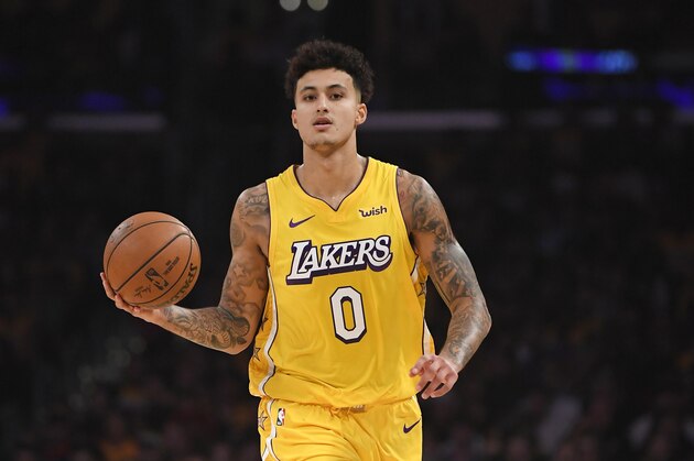 Los Angeles Lakers forward Kyle Kuzma dribbles during the first half of an NBA basketball game against the Washington Wizards Friday, Nov. 29, 2019, in Los Angeles. (AP Photo/Mark J. Terrill)