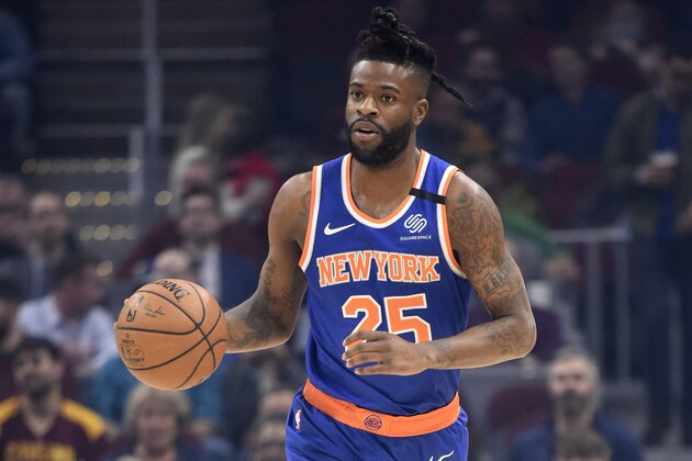 CLEVELAND, OHIO - FEBRUARY 03: Reggie Bullock #25 of the New York Knicks drives down court during the first half against the Cleveland Cavaliers at Rocket Mortgage Fieldhouse on February 03, 2020 in Cleveland, Ohio. NOTE TO USER: User expressly acknowledges and agrees that, by downloading and/or using this photograph, user is consenting to the terms and conditions of the Getty Images License Agreement. (Photo by Jason Miller/Getty Images)