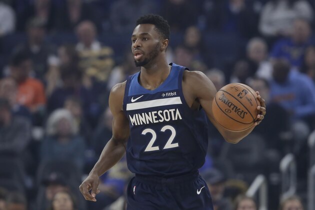 Minnesota Timberwolves forward Andrew Wiggins brings the ball up during the first half of the team's NBA basketball game against the Golden State Warriors in San Francisco, Monday, Dec. 23, 2019. (AP Photo/Jeff Chiu)