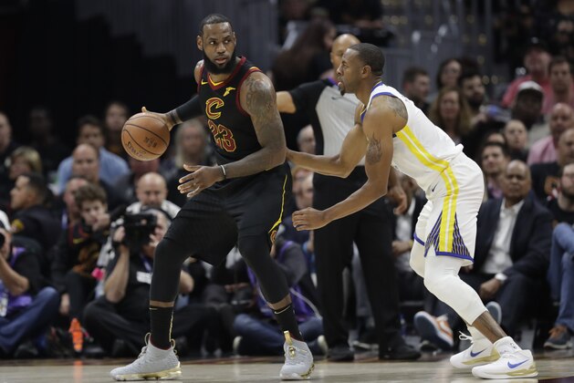 Golden State Warriors forward Andre Iguodala (9) defends Cleveland Cavaliers forward LeBron James (23) in the first half of Game 3 of basketball's NBA Finals, Wednesday, June 6, 2018, in Cleveland. (AP Photo/Tony Dejak) Golden State Warriors forward Andre Iguodala (9) defends Cleveland Cavaliers forward LeBron James (23) in the first half of Game 3 of basketball's NBA Finals, Wednesday, June 6, 2018, in Cleveland. (AP Photo/Tony Dejak)