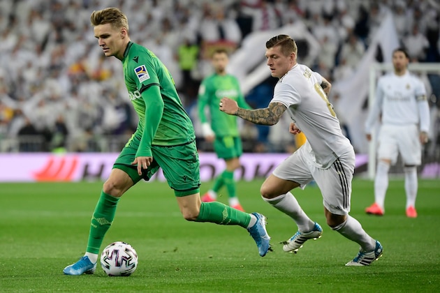 Real Sociedad's Norwegian midfielder Martin Odegaard (L) vies with Real Madrid's German midfielder Toni Kroos during the Spanish Copa del Rey (King's Cup) quarter-final football match Real Madrid CF against Real Sociedad at the Santiago Bernabeu stadium in Madrid on February 06, 2020. (Photo by JAVIER SORIANO / AFP) (Photo by JAVIER SORIANO/AFP via Getty Images)